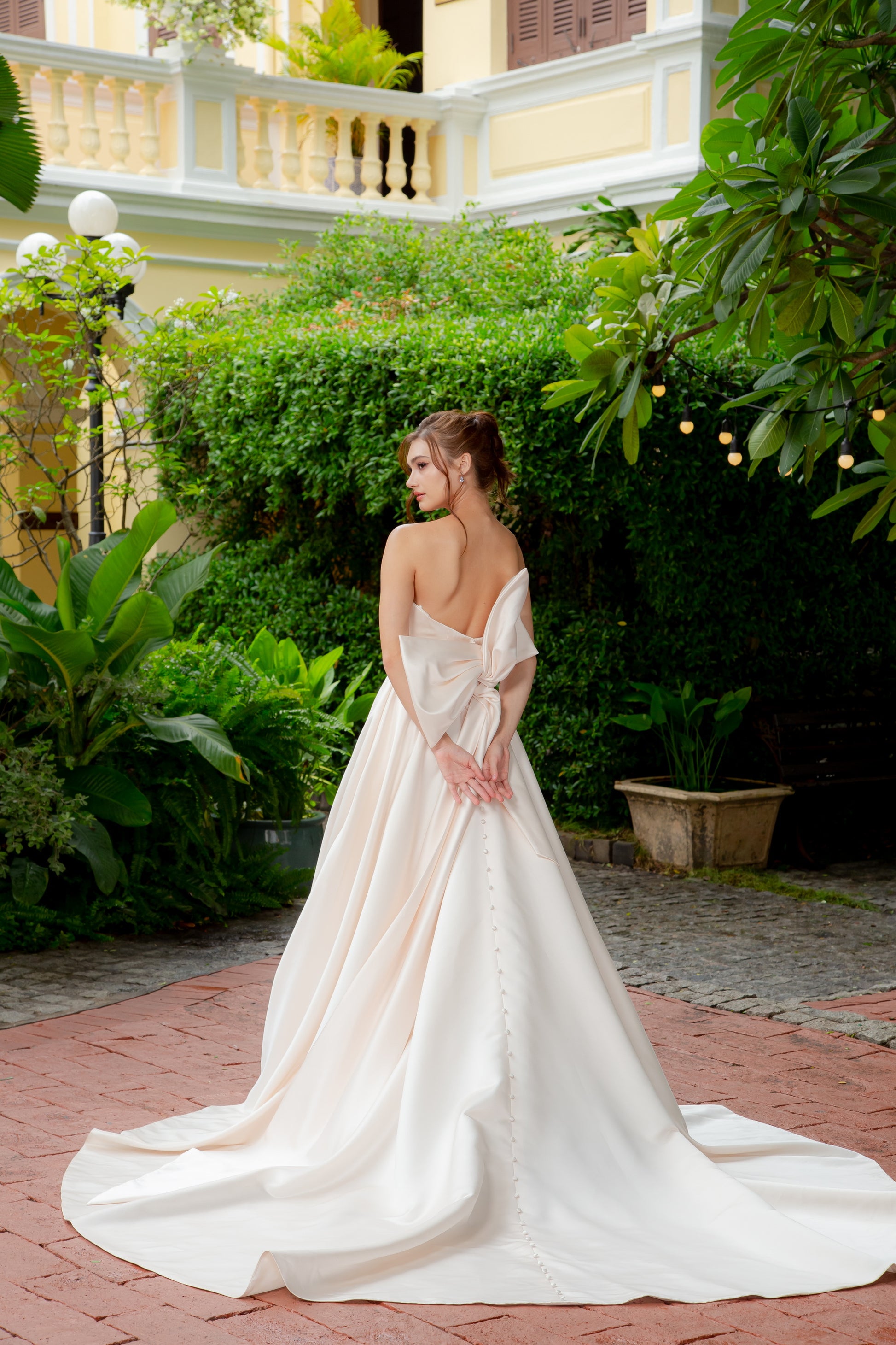 Vintage Rose Satin Ball Gown with Detachable Bow & Cathedral Train | Briderful - back bow