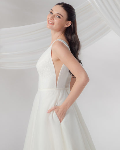 Double Deep V-Neck Wedding Gown with Removable Cathedral Train | Briderful - side