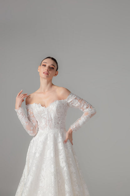 Off-the-Shoulder Long Sleeve Lace Ball Gown with Cathedral Train | Briderful - fabric detail